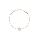 Rose gold bracelet with a slim adjustable chain, featuring a round mother of pearl charm framed by white cubic zirconia crystals and a secure lobster clasp.