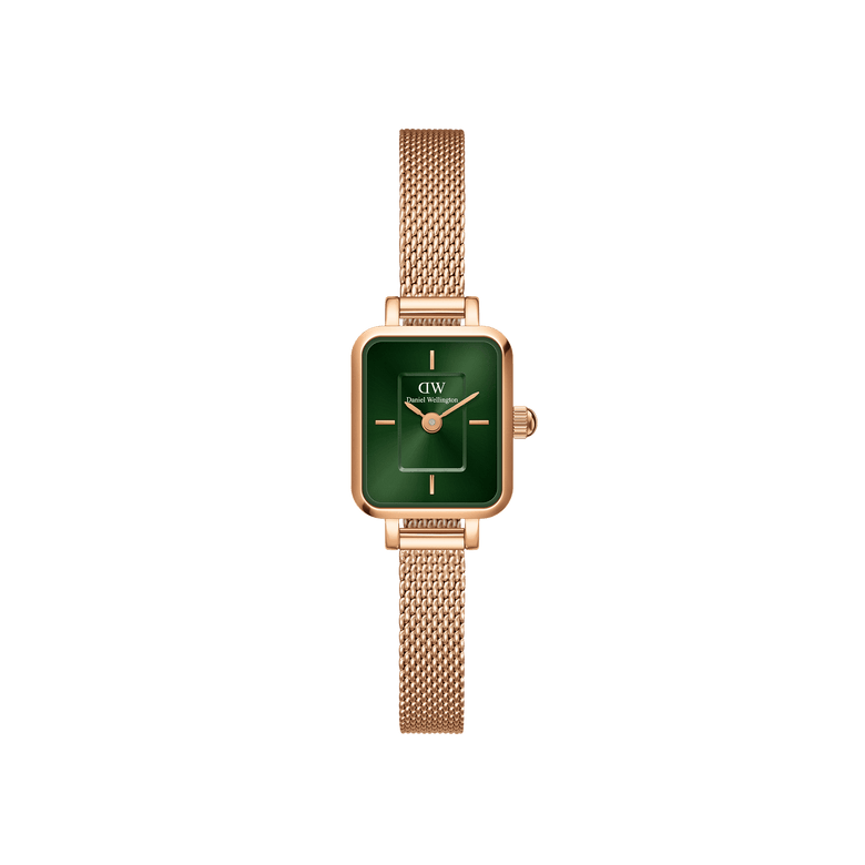 Quadro Mini Melrose Emerald features a slim rectangular case with an emerald green dial and a rose gold mesh bracelet, offering a minimalist and elegant look suitable for everyday wear.