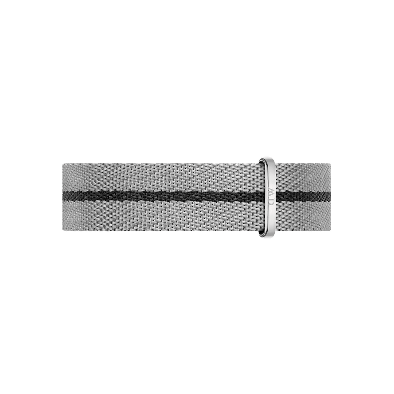 Grey and black NATO strap from Daniel Wellington, made with recycled nylon and featuring a twill weave and adjustable stainless steel buckle.