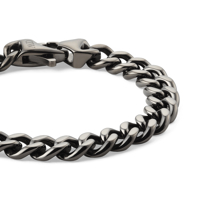 Close-up of the Ellipse Cuban Chain Bracelet Graphite, highlighting its bold polished links and sturdy lobster clasp in a deep graphite finish, crafted from durable 316L stainless steel.