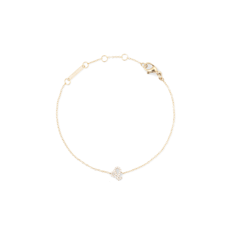 Slim gold chain bracelet with an adjustable clasp, featuring a Leo zodiac charm set with sparkling crystals for a subtle, personalised touch.
