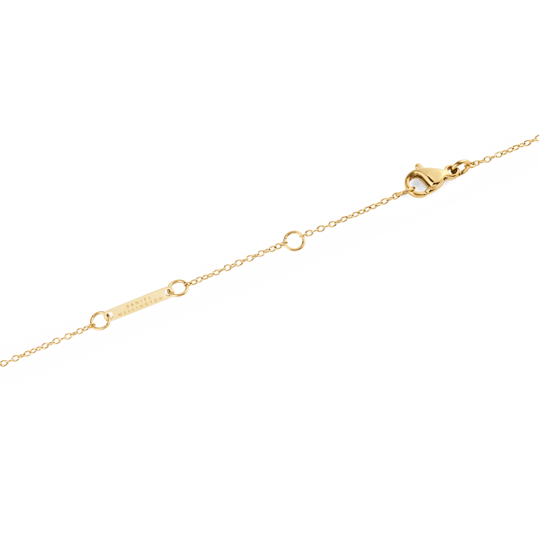 Close-up of the Mirelle Solitaire Necklace Gold showing the adjustable gold chain with multiple fastening loops and a secure clasp, highlighting the fine craftsmanship and delicate finish.