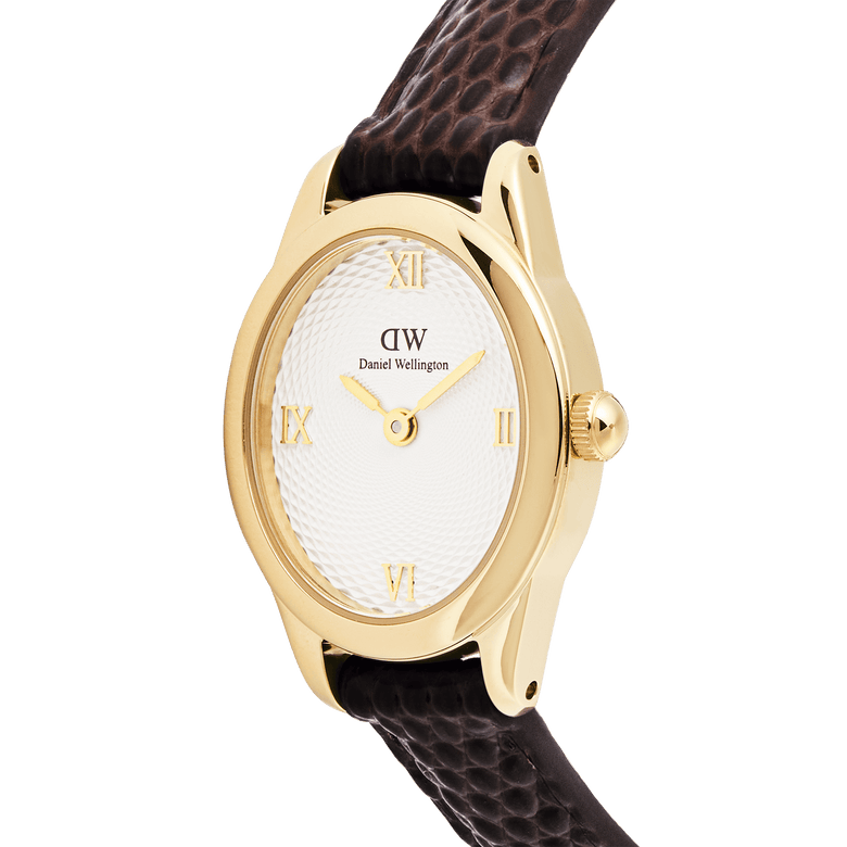 Close-up of the Ophelia Mini Dark Brown Lizard White Guilloché Gold watch, highlighting its polished gold oval case, textured white guilloché dial with gold Roman numerals, and dark brown lizard-embossed leather strap.