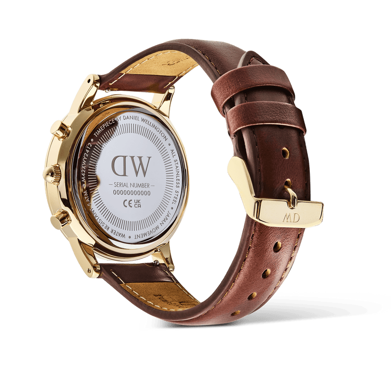 Back view of the Iconic Chronograph St Mawes Emerald Panda Gold men’s watch, showing the engraved stainless steel case, gold finish, and brown padded leather strap with gold pin buckle.