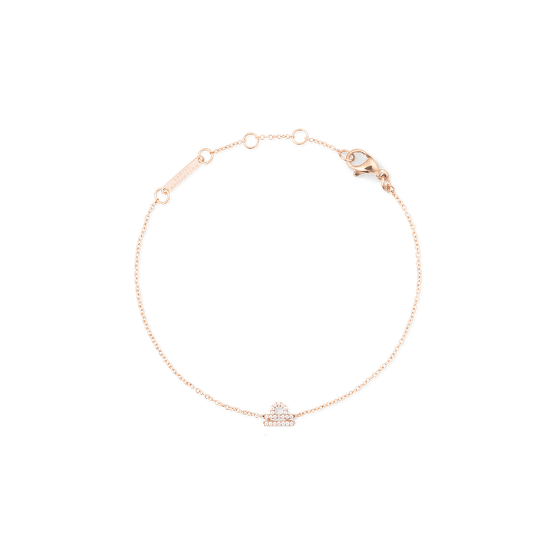 Crystal Zodiac Chain Bracelet Rose Gold featuring a slim rose gold chain with an adjustable clasp and a sparkling crystal Libra zodiac pendant, designed for comfortable everyday wear.