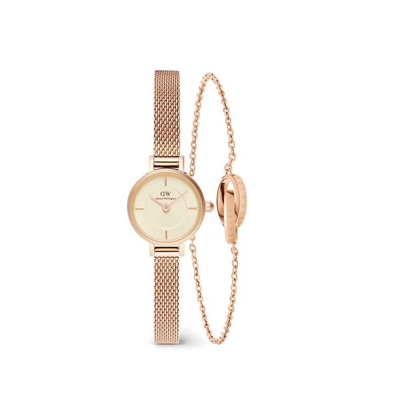 Rose gold ladies watch with a 28mm dial and mesh strap, paired with a delicate rose gold Elan Unity Bracelet featuring an interlocking ring motif, both designed for a refined and minimalist look.