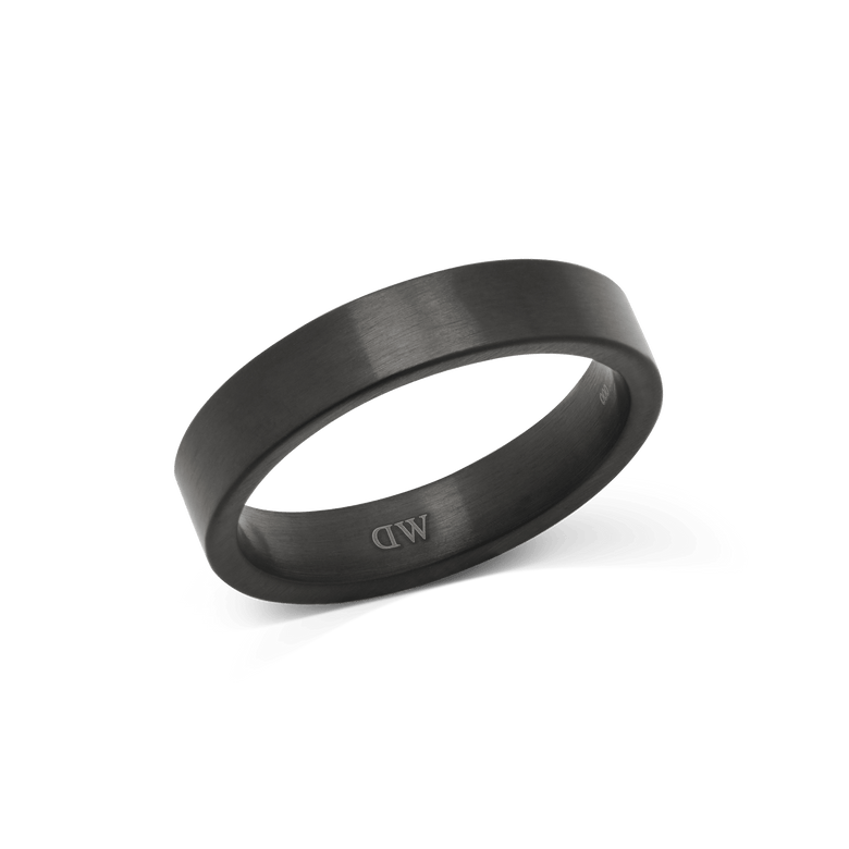 A brushed graphite ring with a matte finish and minimalist design, featuring a 4.5mm width and discreet interior branding, crafted from stainless steel for durability.