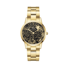 Limited edition Steven Harrington x Daniel Wellington Iconic Link Dual Tone gold watch with a black dial featuring bold artistic linework, gold stainless steel case and bracelet, and classic 3-link design.