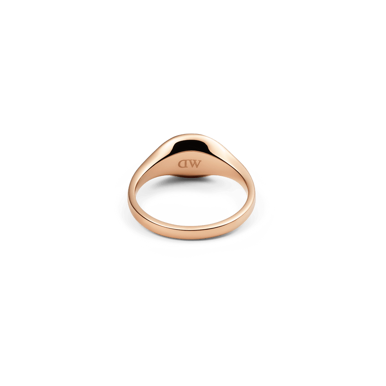 Classic Mini Signet Ring Rose Gold shown from the inside, highlighting the smooth rose gold finish and the engraved detail on the inner band.