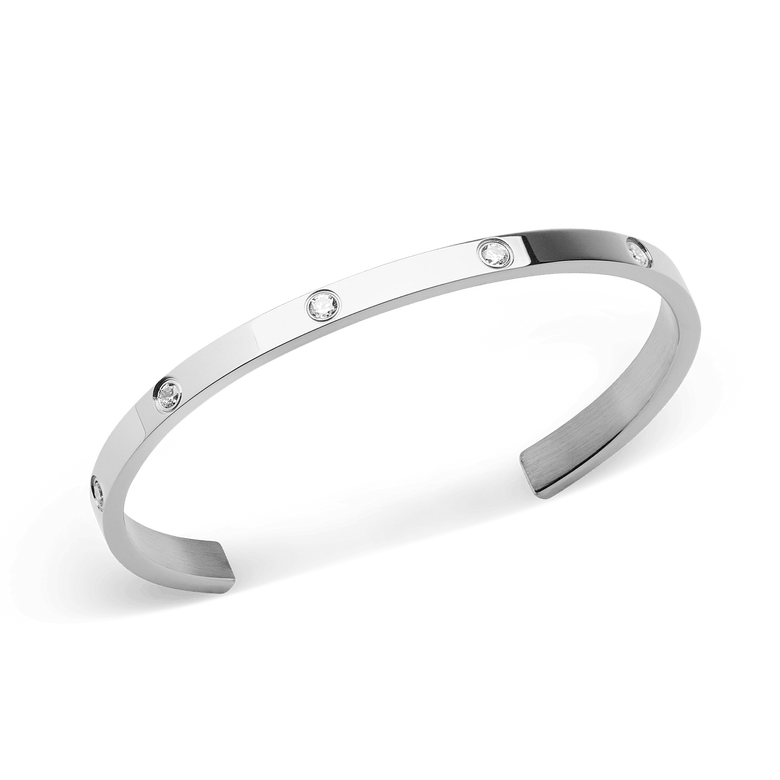 Classic Lumine Bracelet Silver 5.5mm with a slim, open bangle design in polished stainless steel, featuring evenly spaced cubic zirconia crystals for a refined, minimalist look.