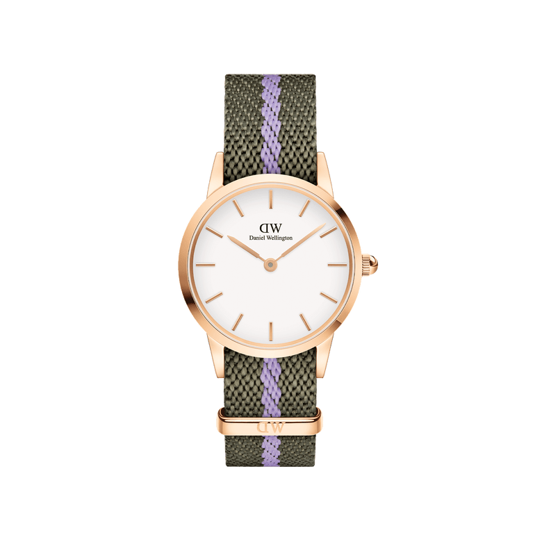 Petite ladies watch with a rose gold case, minimalist white dial, and a green and purple NATO strap, designed for everyday comfort and style. The adjustable recycled nylon strap and refined rose gold details make it a versatile accessory for casual or work outfits.
