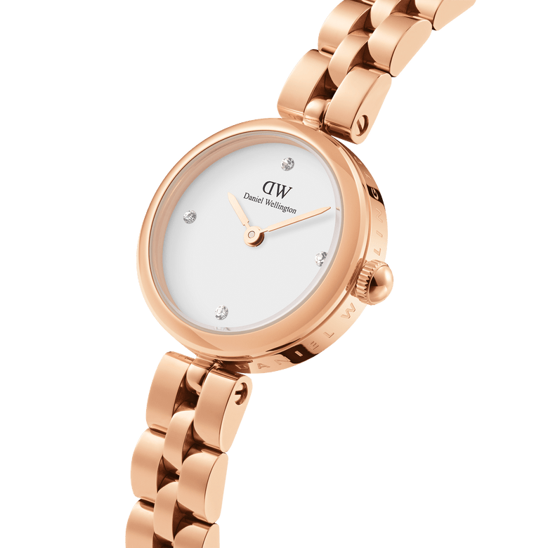 Close-up of the Elan Lumine Rose Gold ladies watch featuring a rose gold three-link bracelet, minimalist white dial, and crystal hour markers, highlighting its refined and modern design.