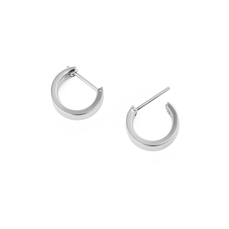 A pair of Line Earring Polished Silver 3.5mm hoop earrings shown open, highlighting their minimalist design, polished silver finish, and latch-back closure.
