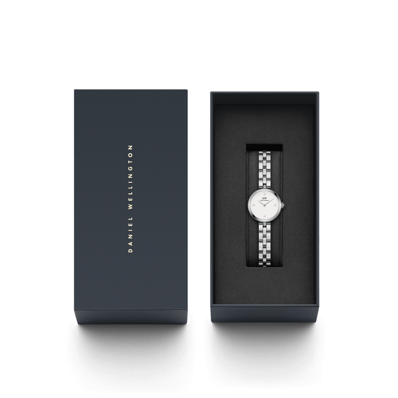 Elan Lumine Silver ladies watch with a stainless steel bracelet and minimalist crystal dial, elegantly presented in a branded Daniel Wellington gift box.
