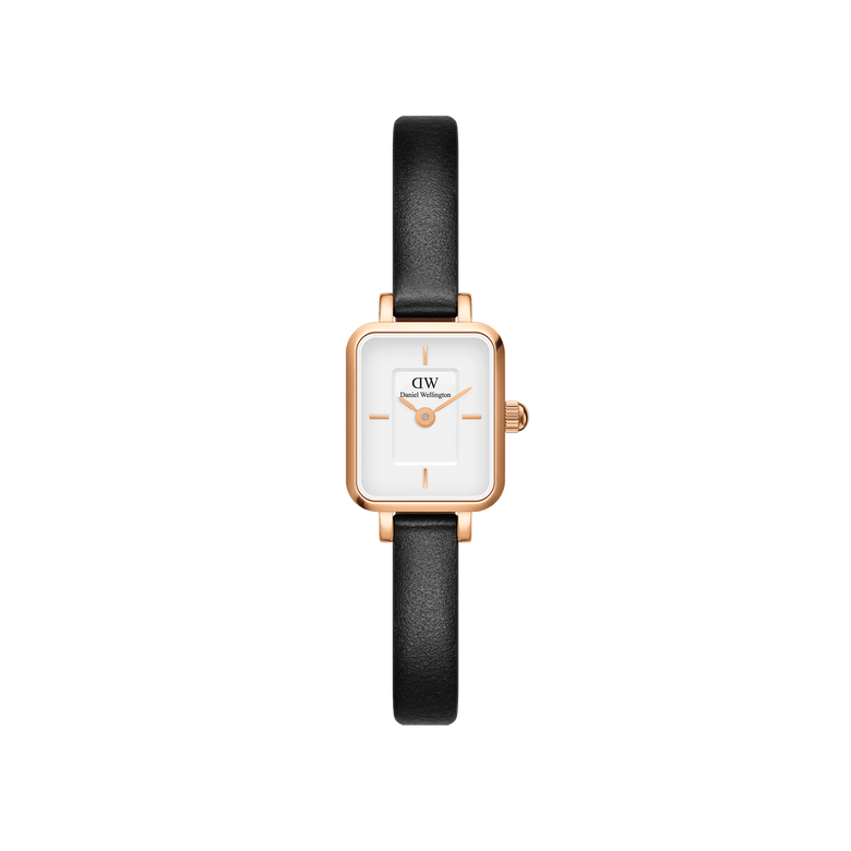Quadro Mini Sheffield Rose Gold ladies watch with a petite rectangular rose gold case, minimalist white dial, and slim black leather strap, designed for comfort and understated elegance.