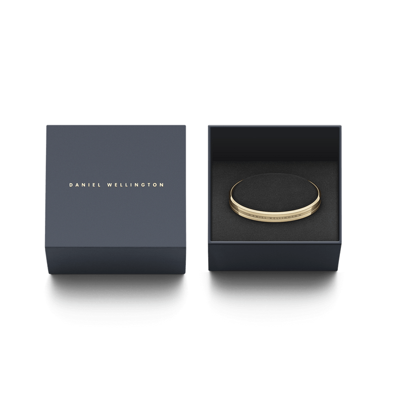 Elan Bracelet Gold presented in a sleek Daniel Wellington gift box, highlighting its polished gold finish and engraved branding, ideal for gifting or special occasions.