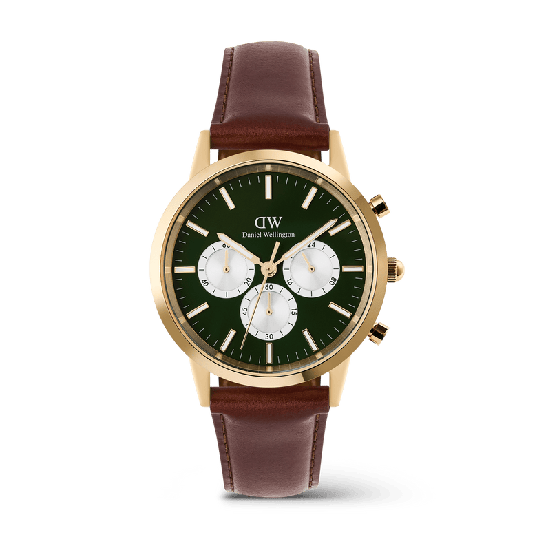 Gold men’s chronograph watch with an emerald green dial, panda-style sub-dials, and a brown stitched leather strap, featuring luminous hands and indexes for clear visibility.