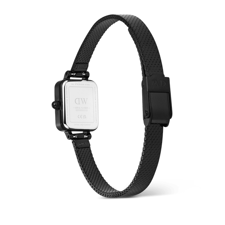 Quadro Mini Reflection Black watch showing the stainless steel case back, slim black mesh strap, and secure clasp buckle, highlighting the durable build and adjustable fit.