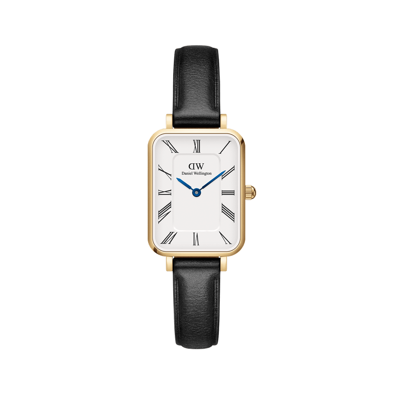 Quadro Roman Numerals Sheffield Gold ladies watch with a rectangular gold case, minimalist white dial featuring Roman numerals, blue steel hands, and a slim black leather strap.