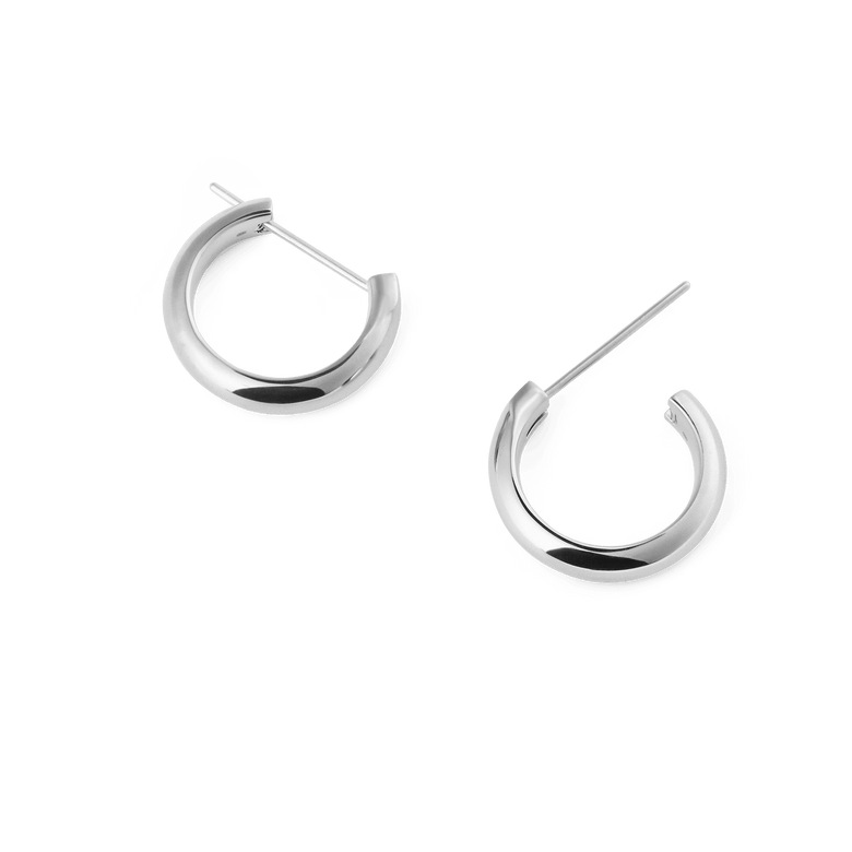 Daniel Wellington Arch Earring Silver 12mm hoop earrings with a polished silver finish, featuring a rounded profile and classic pin closure, displayed side by side on a plain background.