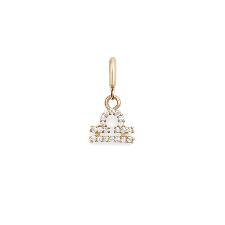 Gold Libra zodiac watch charm with sparkling cubic zirconia crystals, featuring a delicate scales symbol in a secure claw setting for versatile styling on watches, bracelets, or jewellery stacks.