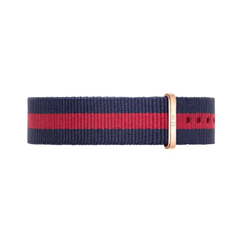 Oxford Strap Rose Gold watch strap featuring a bold navy blue and red stripe in durable polyester, finished with a sleek rose gold buckle for a stylish and contemporary look.
