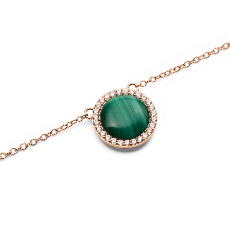 Close-up of the Audrey Necklace Malachite Rose Gold pendant, showcasing a domed green malachite stone encircled by sparkling white cubic zirconia crystals on a fine rose gold chain.