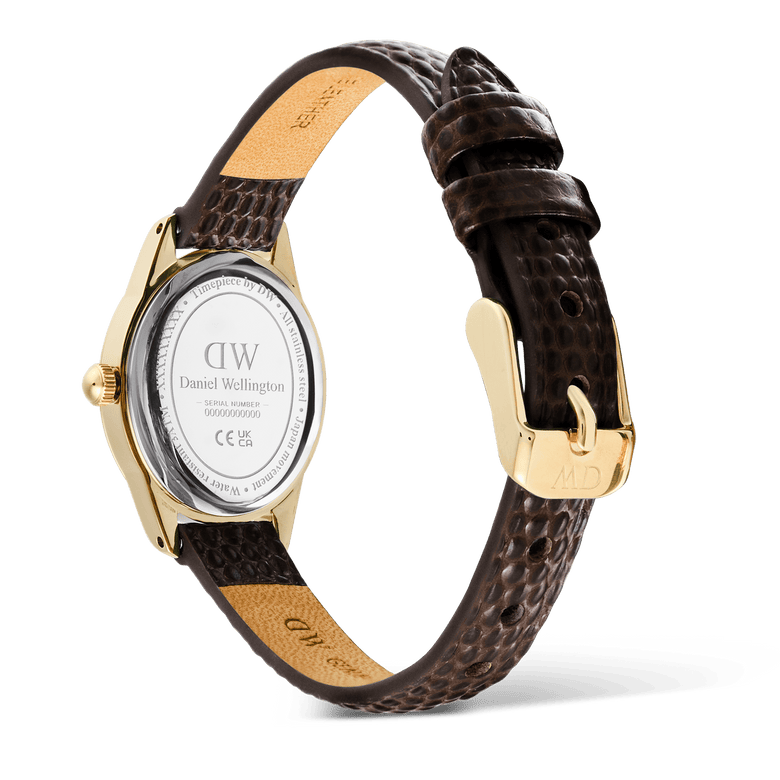 Rear view of the Ophelia Mini Dark Brown Lizard White Guilloché Gold watch, showing the gold case back, engraved details, and the adjustable dark brown lizard-embossed leather strap with a gold pin buckle.