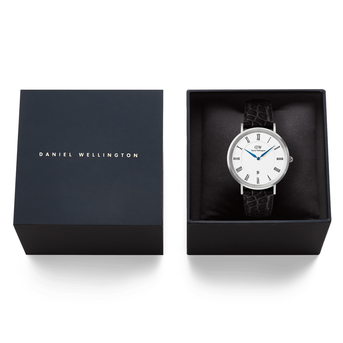Classic Roman Numerals Date Black Croc Belly Silver watch presented in a Daniel Wellington branded gift box, featuring a white dial with black Roman numerals, blue hands, and a black croc-embossed leather strap.