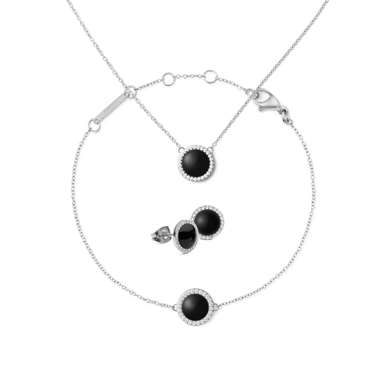 Daniel Wellington Audrey Black Agathe Silver Set featuring a matching necklace, bracelet, and stud earrings, each with a polished silver finish and round black agate stones framed by sparkling accents.