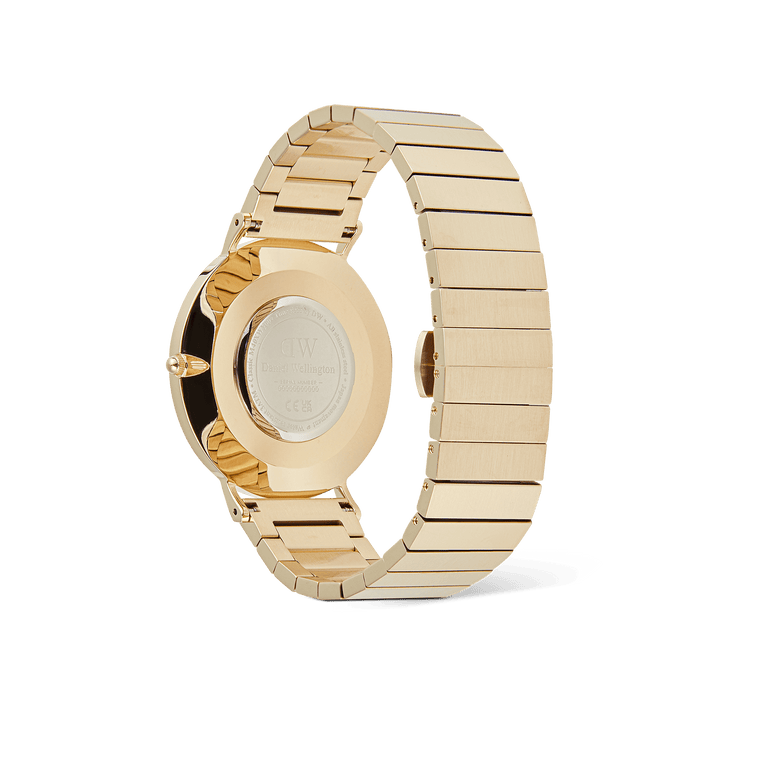 Rear view of the Classic Piano Link Gold Unitone watch showing the brushed gold stainless steel piano link bracelet, butterfly clasp, and engraved case back.