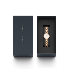 Elan Lumine Rose Gold ladies watch with a rose gold three-link bracelet and minimalist white dial, elegantly presented in a Daniel Wellington branded gift box.