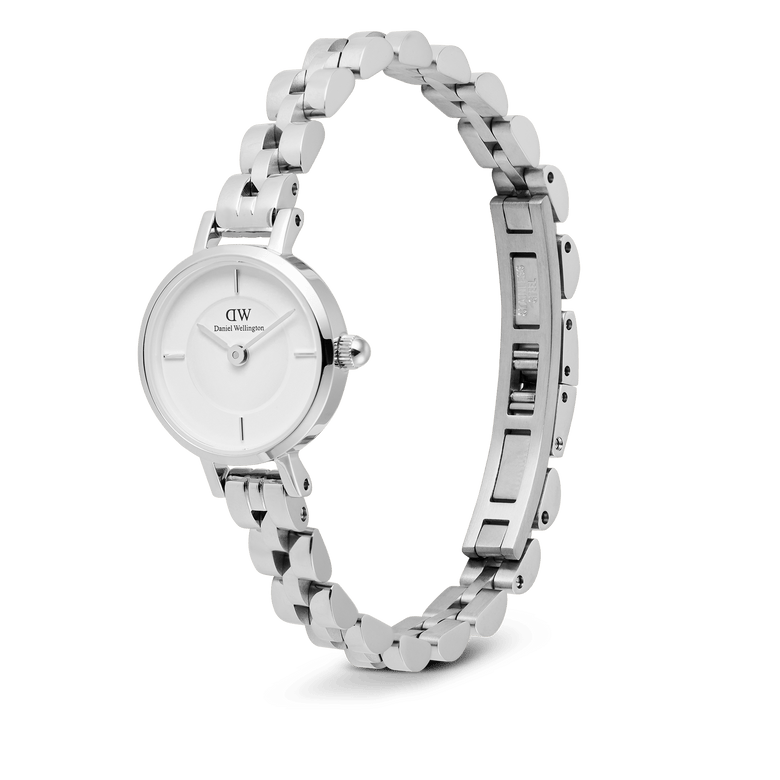 Petite Mini Arch 3-link White Silver watch featuring a petite 19mm stainless steel case, minimalist white dial, and an arched three-link bracelet with a buttonless butterfly clasp for a seamless, elegant finish.