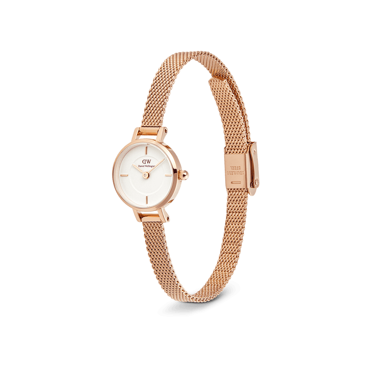 Petite Mini Melrose ladies watch with a rose gold mesh strap, minimalist white dial, and slim stainless steel case, shown at an angle to highlight its elegant and adjustable bracelet design.