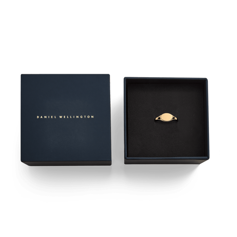 Classic Mini Signet Ring Rose Gold displayed in an open Daniel Wellington gift box, highlighting its polished rose gold finish and elegant presentation for gifting or special occasions.