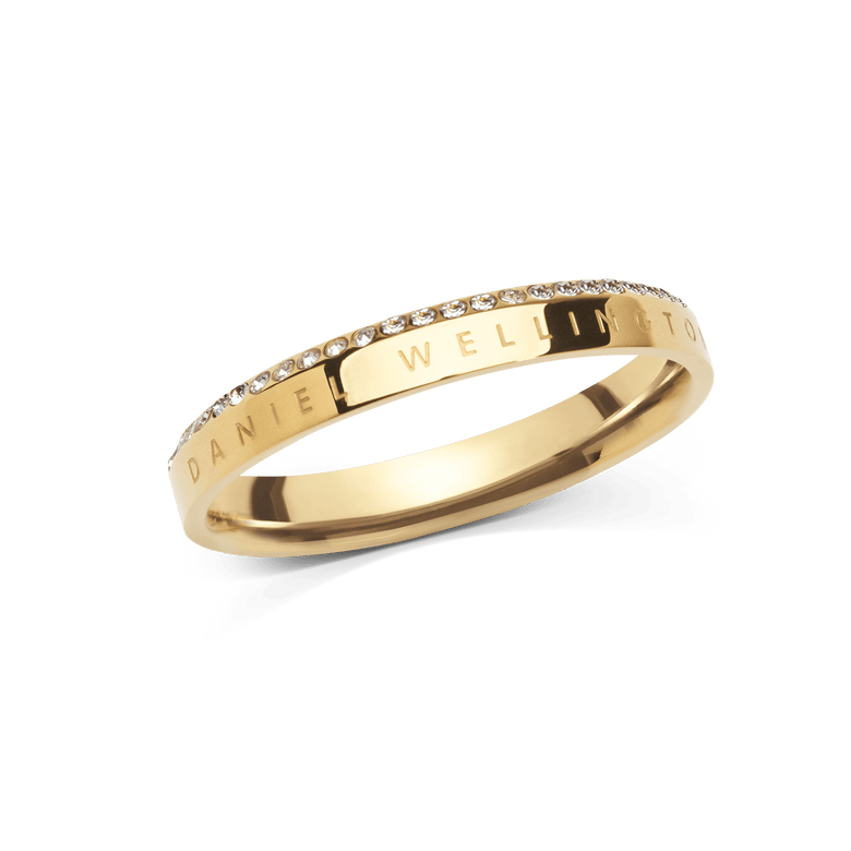 Classic Aura Ring Gold featuring a slim gold band with a polished finish, engraved branding, and a refined row of sparkling white crystals along the edge.