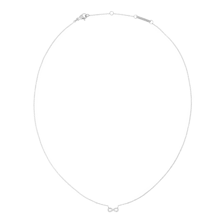 Fine silver chain necklace featuring a minimalist infinity pendant set with white cubic zirconia crystals, designed for everyday wear and easy layering.