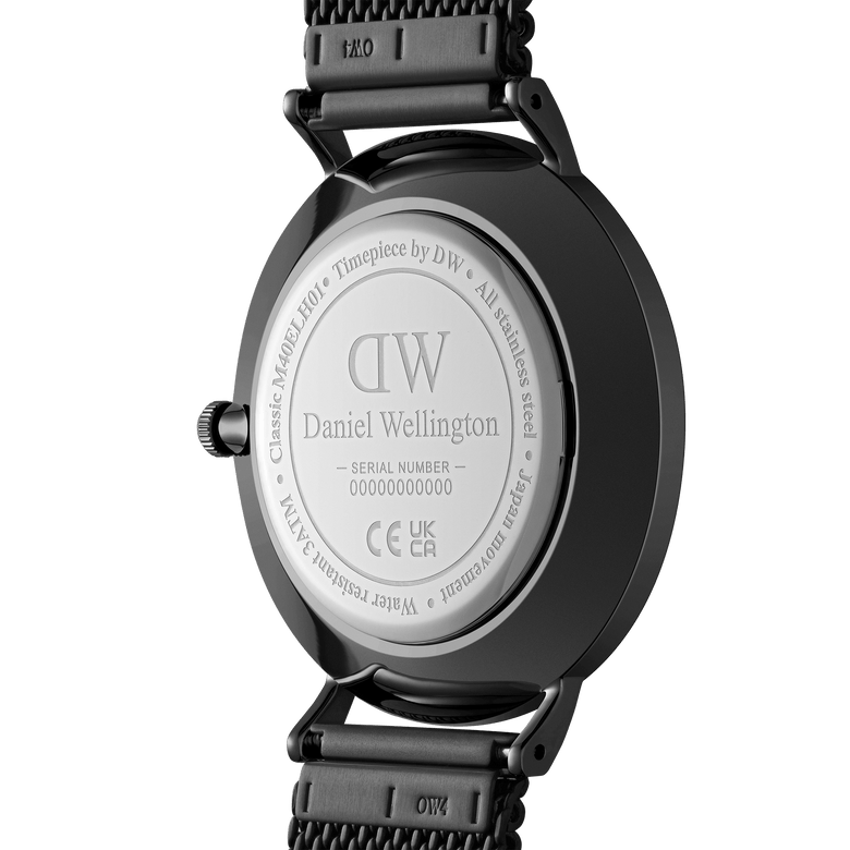 Back view of the Classic Multi-Eye Ashfield Onyx men's watch showing the stainless steel case, engraved branding, and black mesh strap with secure clasp.