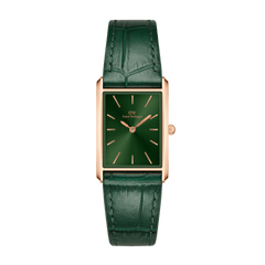 Rectangular rose gold watch with a deep green sunray dial and an emerald green crocodile-embossed leather strap, featuring minimalist hour markers and a slim profile.