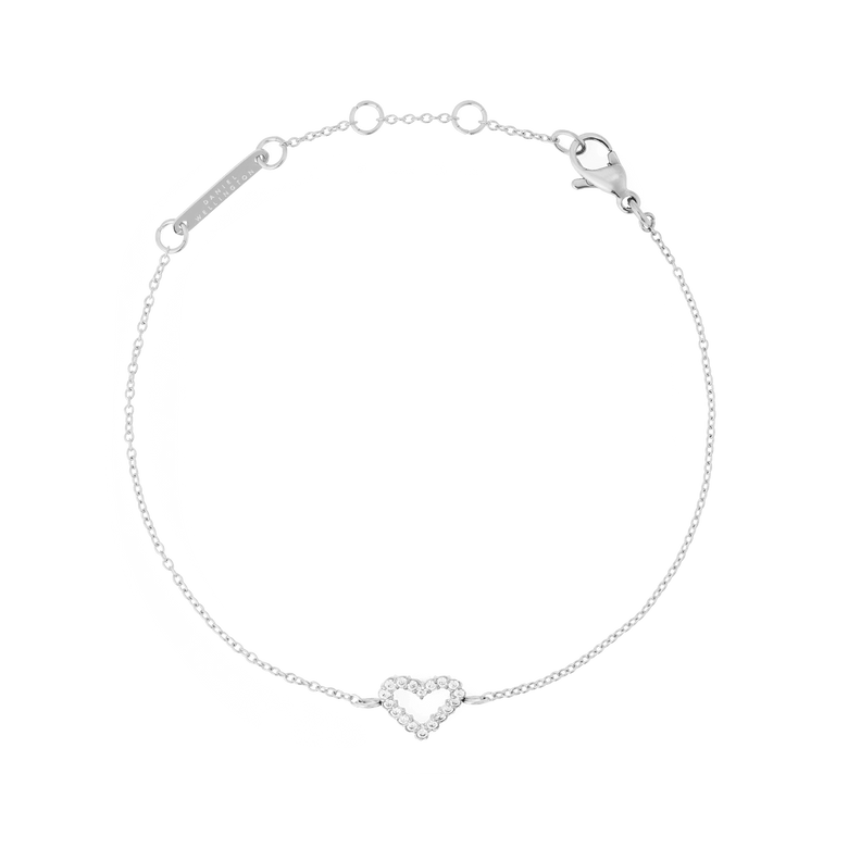 Slim silver bracelet with an open heart charm set with cubic zirconia stones, featuring an adjustable chain and secure clasp for comfortable everyday wear.