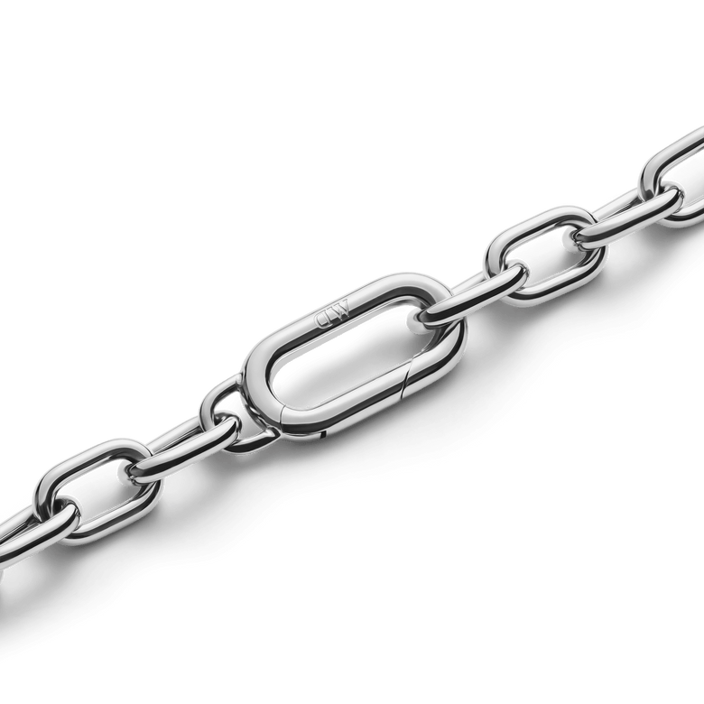 Detail of the Crystal Link Necklace Silver showing the polished chunky chain and secure spring gate clasp, crafted from stainless steel and rhodium plated brass for durability and style.