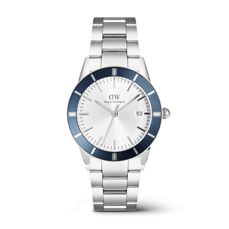 Men’s silver stainless steel watch with a 40mm white dial, bold blue bezel, minimalist index markings, and a three-link bracelet, featuring a date display and polished finish.