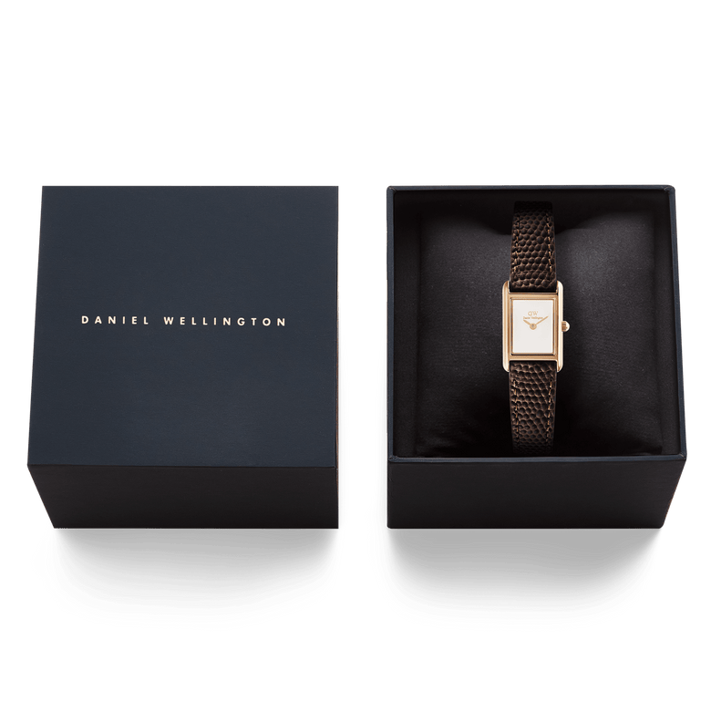 Bound Mini Dark Brown Lizard Rose Gold watch with a rectangular rose gold case and brown lizard-grain leather strap, elegantly presented in a Daniel Wellington gift box.
