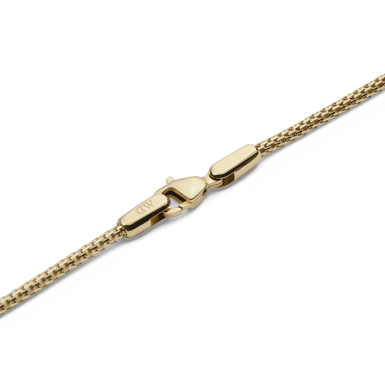 Detail of the Tide Mesh Necklace Gold 1.8 showing the polished gold lobster clasp and fine mesh chain, highlighting the secure fastening and quality craftsmanship.