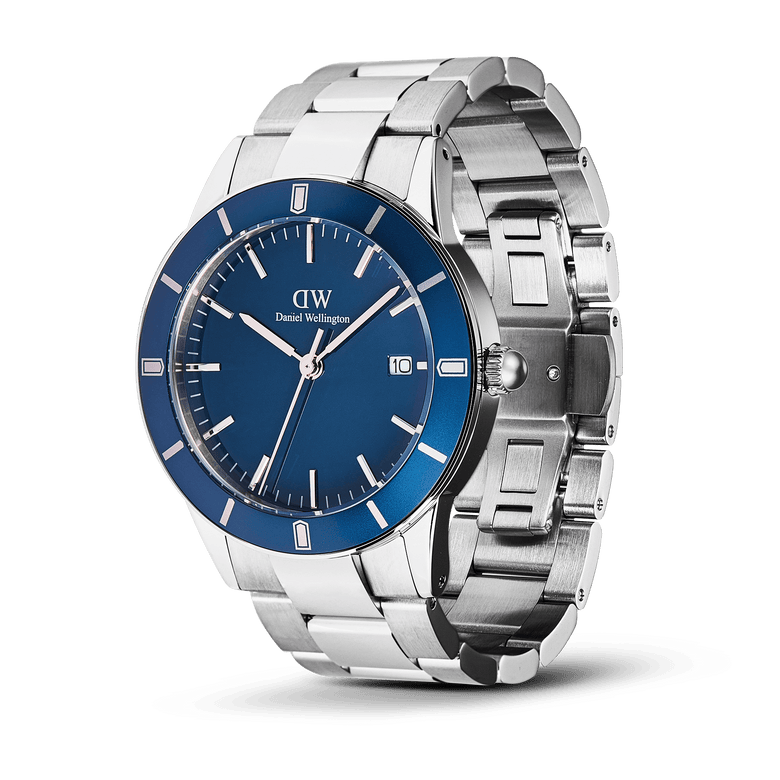 Iconic Paradigma Link Blue Enamel Silver men’s watch with a vibrant blue enamel dial, satin-finish bezel, date display, and a polished and brushed stainless steel three-link bracelet.