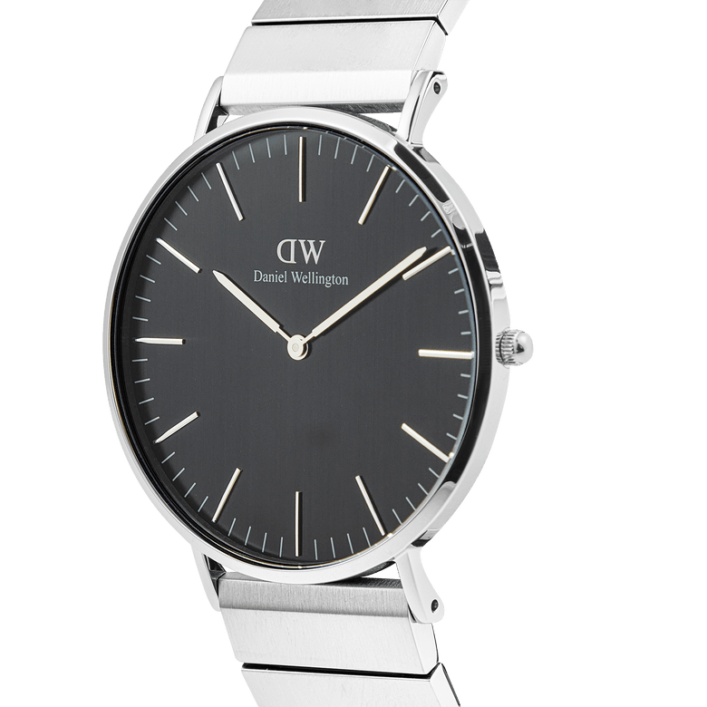 Classic Piano Link Onyx Silver men’s watch with a brushed black dial, minimalist silver hour markers, and a geometric silver stainless steel strap, shown from a side angle.