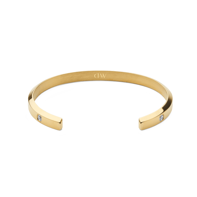 Classic Lumine Bracelet Gold 55mm featuring a minimalist open cuff design, polished gold finish, and sparkling cubic zirconia stones set at each end for a subtle, elegant look.