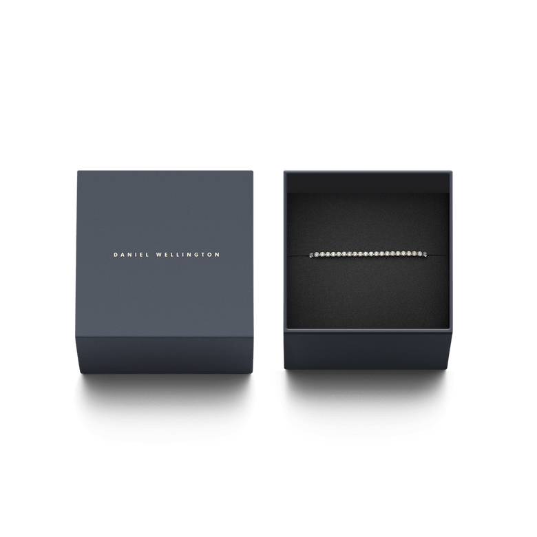 Classic Tennis Necklace Gold presented in a navy Daniel Wellington gift box, highlighting its sparkling crystal design and elegant packaging, ideal for gifting.