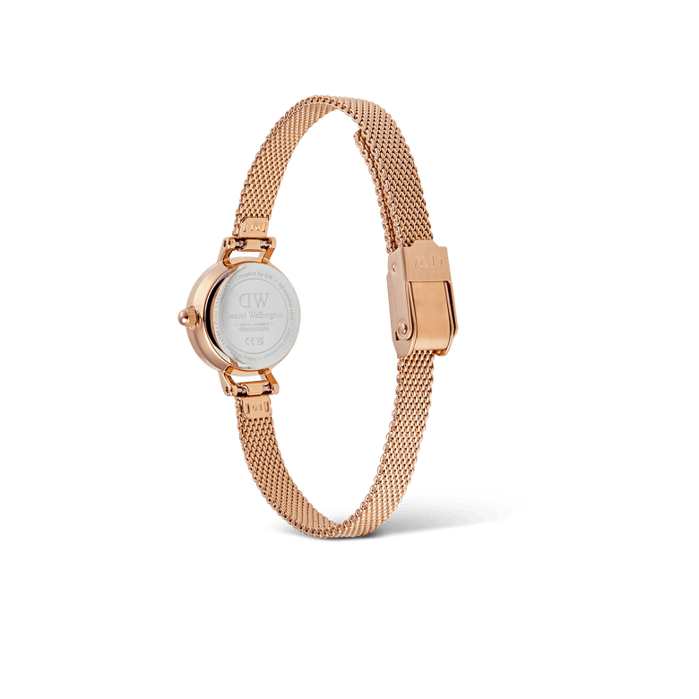 Petite Mini Melrose ladies watch shown from the back, featuring a stainless steel case and adjustable rose gold mesh strap with a secure clasp, highlighting its quality craftsmanship.