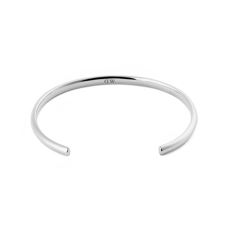 Arch Cuff Silver 6mm with a minimalist, open cuff design and a polished silver finish, crafted from 316L stainless steel and featuring a discreet logo on the inner surface.